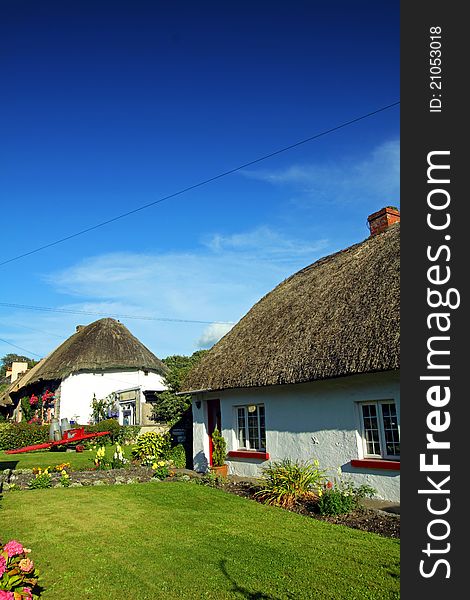 Old Style Irish Cottage Adare Co. Limerick on a sunny summers day