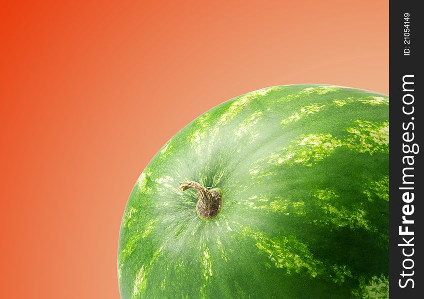 Ripe water-melon on red-yellow Gradient a background. Ripe water-melon on red-yellow Gradient a background