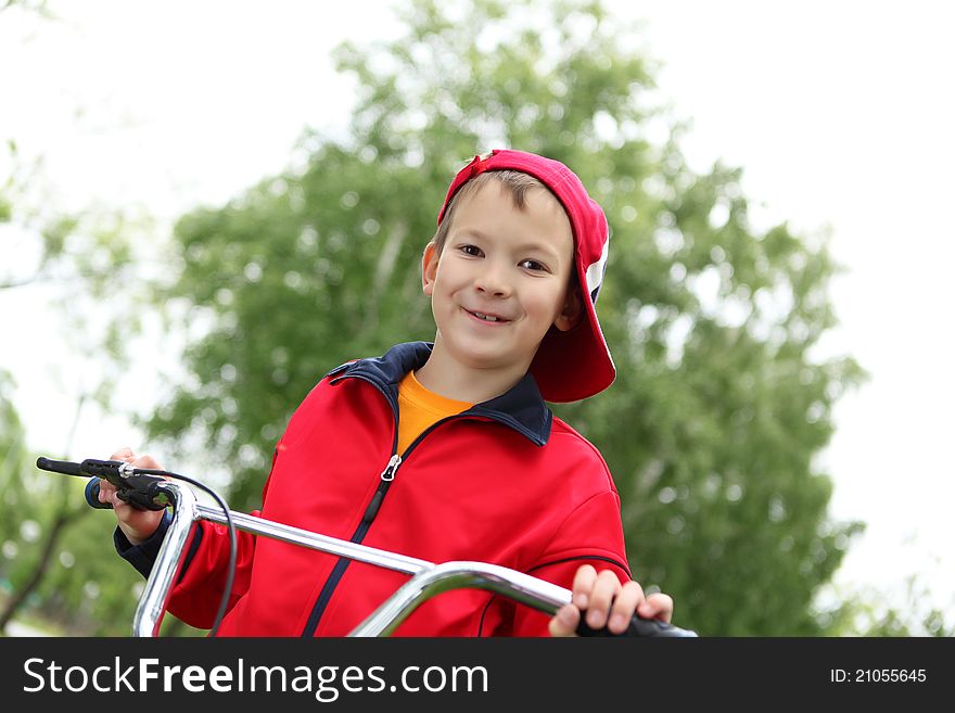 Boy On A Bicycle In The Green Park