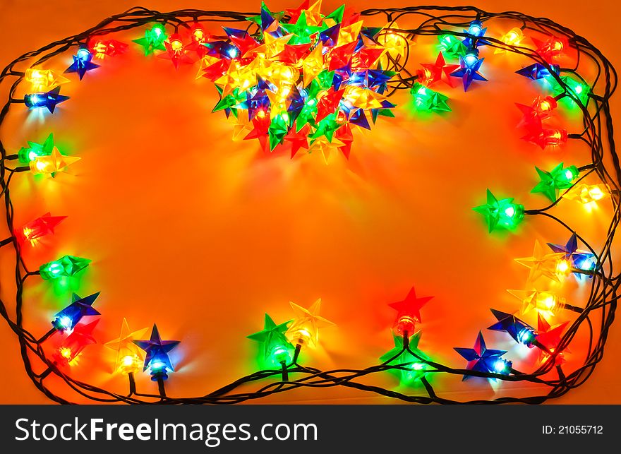 Garland of colored lights for Christmas trees. Spread out to a table