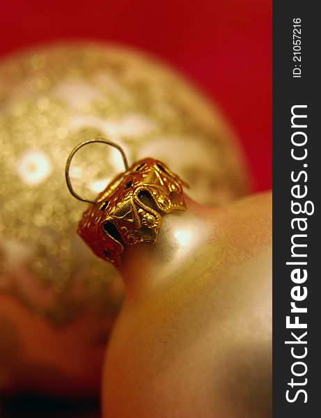Close up of gold Christmas tree ornaments