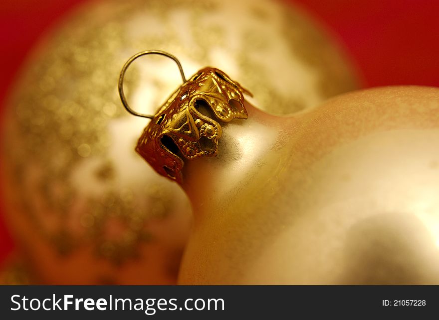 Close up of gold Christmas tree ornaments