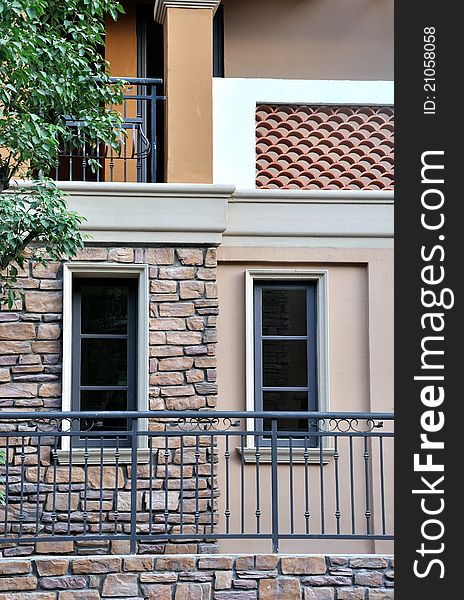 A small villa building out looking, including wall, windows and corridor, shown as architecture geometric and shape, different color and texture. A small villa building out looking, including wall, windows and corridor, shown as architecture geometric and shape, different color and texture.