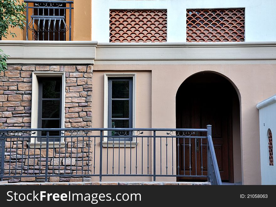 A small villa building out looking, including wall, windows and corridor, shown as architecture geometric and shape, different color and texture. A small villa building out looking, including wall, windows and corridor, shown as architecture geometric and shape, different color and texture.