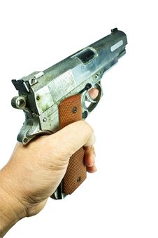 Gun In Hand. Stock Images