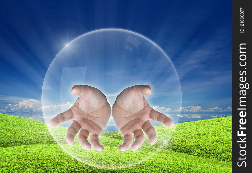 Help concept by hands in air bubble with nature background.