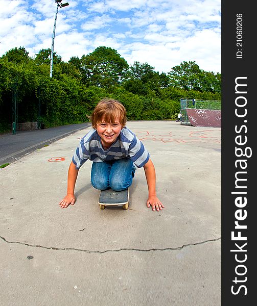 Boy enjoys skating at the skate park