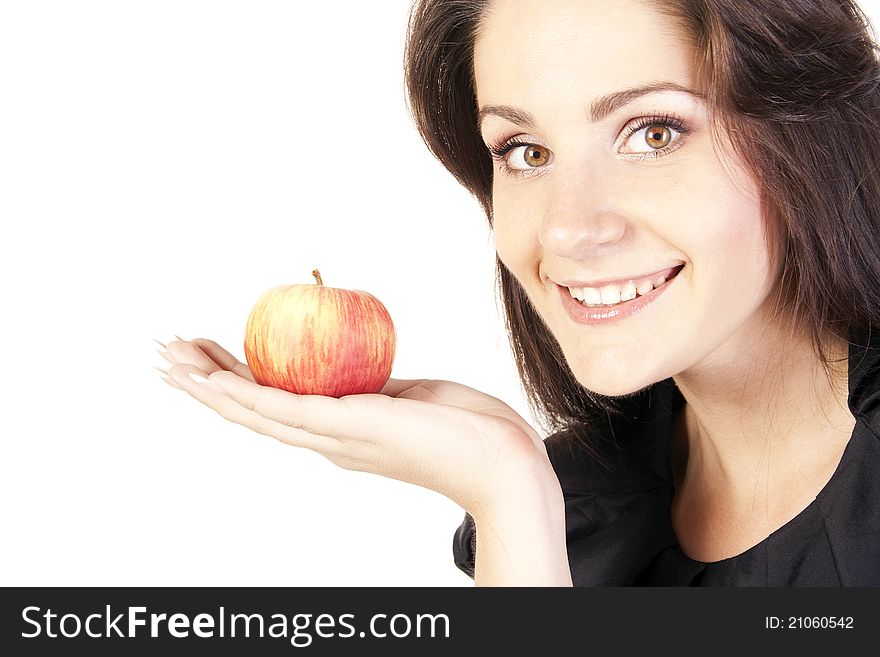 Young woman with apple in studio