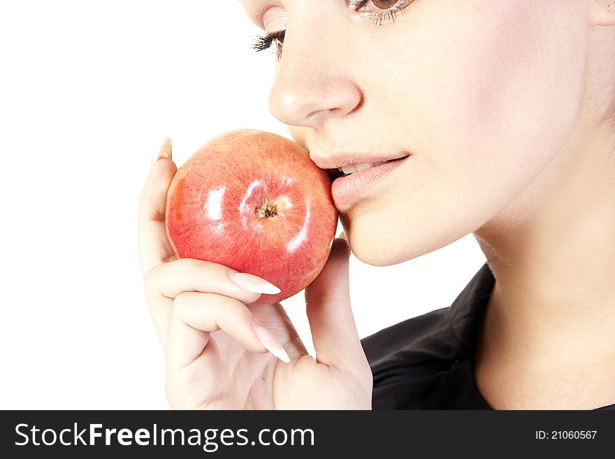 Young woman with apple in studio