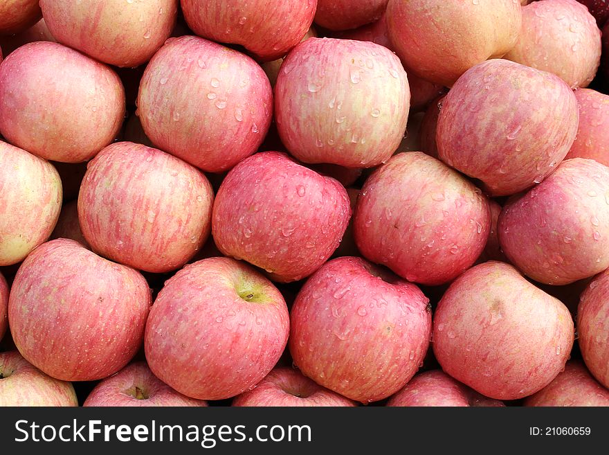 A lot of fresh apples exposed on market