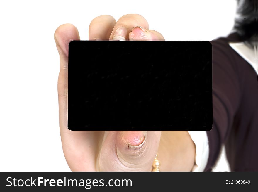 The female hand holding a bank card on a white background