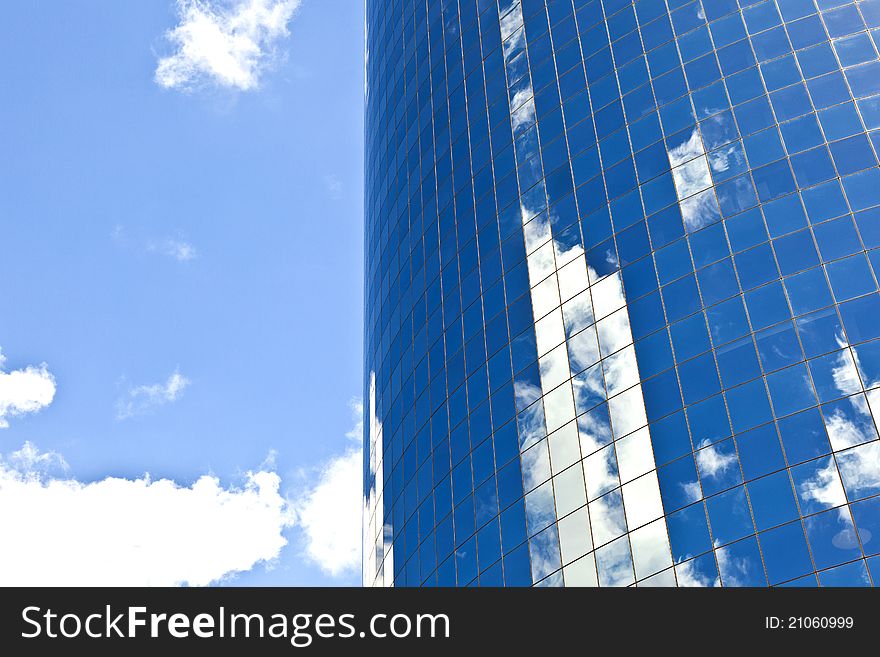 Facade of Skyscraper with reflection of sky in New York