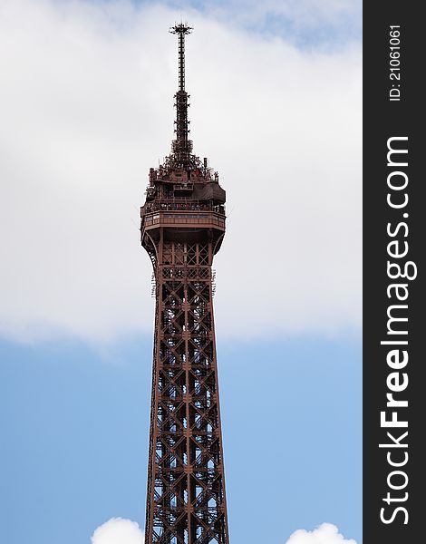 Apex of Eiffel tower on the background sky. Apex of Eiffel tower on the background sky