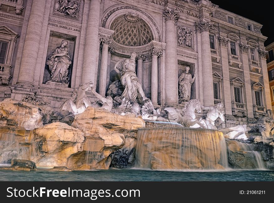 Famous fountain illuminated at night. Rome, Italy. Famous fountain illuminated at night. Rome, Italy
