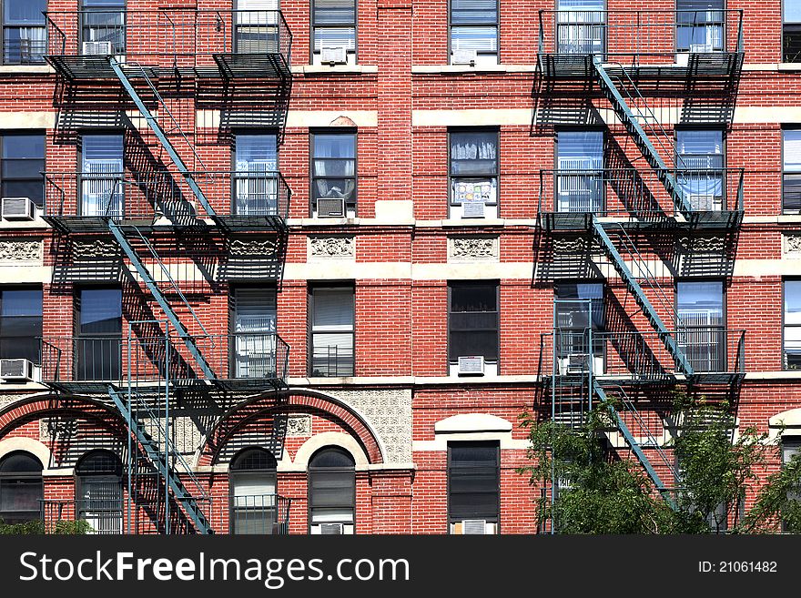 Fire ladder at old houses downtown in New York