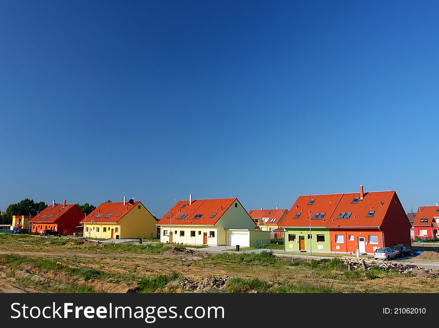 Colorful semi-detached houses - free copy space. Colorful semi-detached houses - free copy space