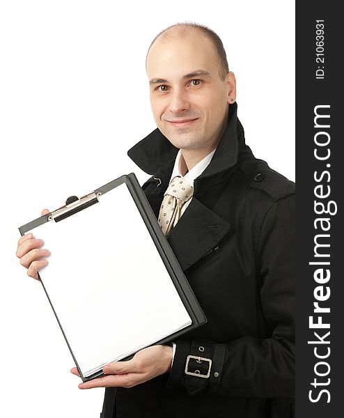 Happy smiling businessman holds a blank paper sheet