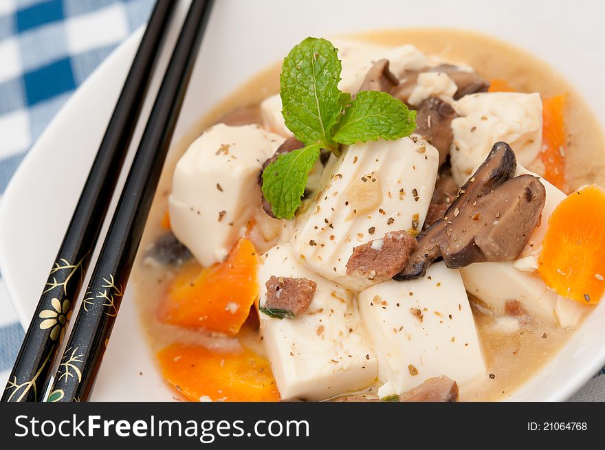 Traditional Oriental delicacy of bean curd topped with Chinese spices. Traditional Oriental delicacy of bean curd topped with Chinese spices.