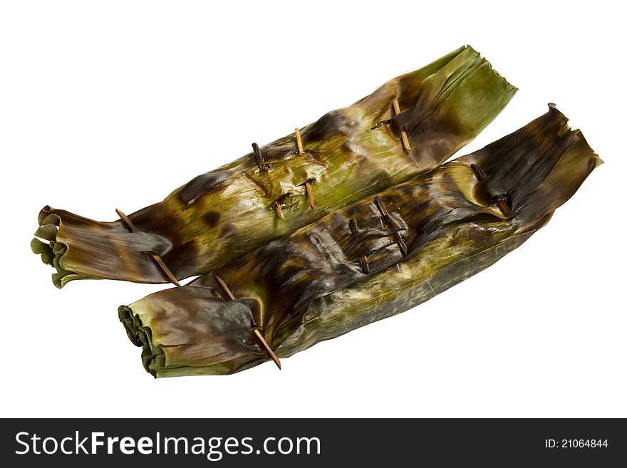 Grill rice wrap in banana leaf isolated on white background