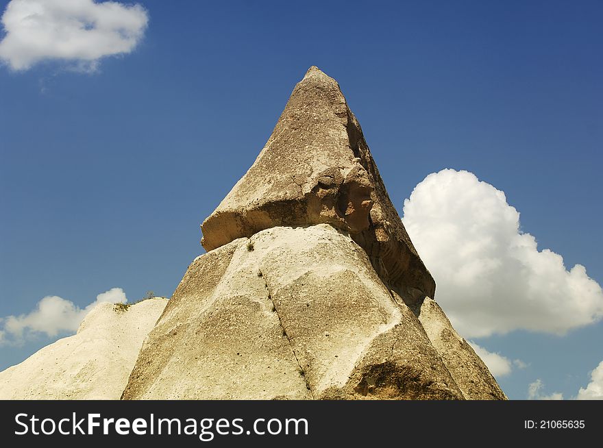 Blue sky and one of fairy chimney in Capadocia, ÃœrgÃ¼p-GÃ¶reme