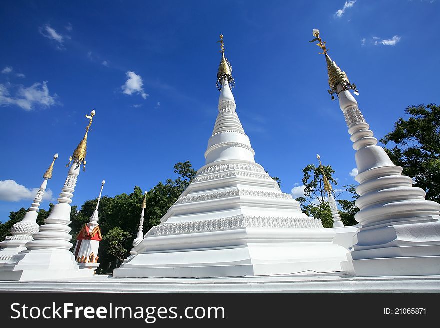 Several Beautiful White Pagodas in Traditional Mon architecture style at Chomphuwek Wat in Nonthaburi Province, Thailand. Several Beautiful White Pagodas in Traditional Mon architecture style at Chomphuwek Wat in Nonthaburi Province, Thailand