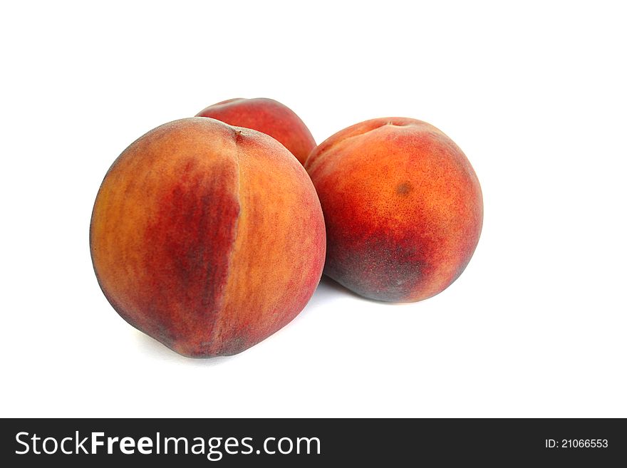 Juicy peach on a white background