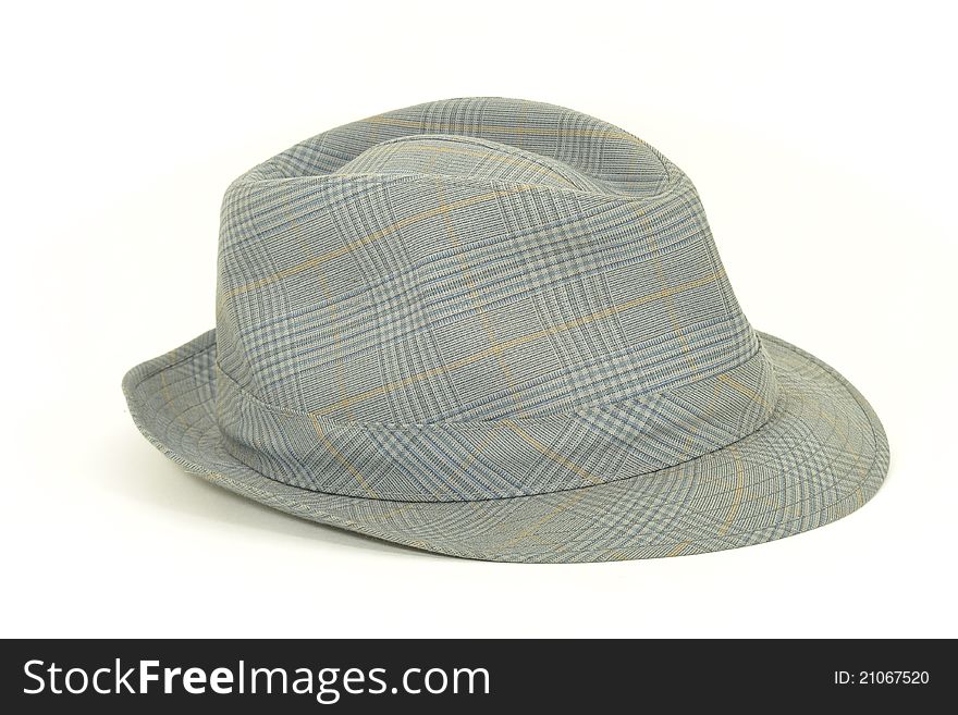 A grey hat with square pattern.