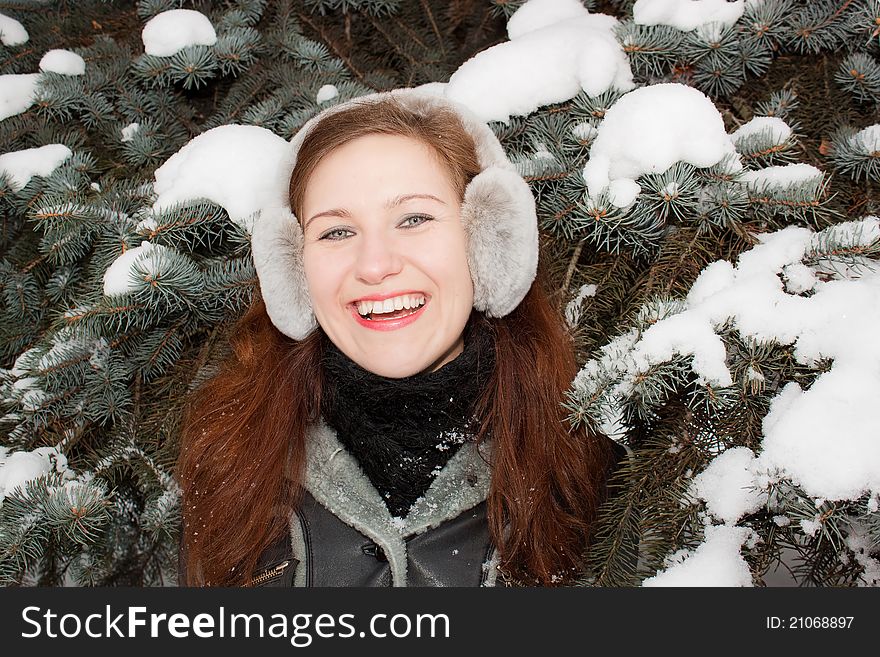 We see smiling young lady in the forest. We see smiling young lady in the forest.