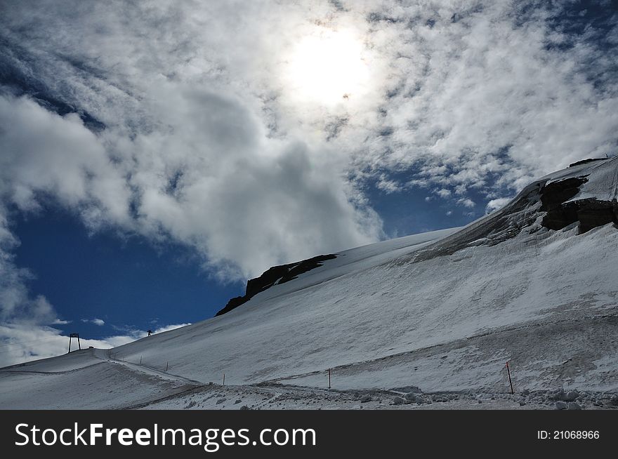 Snow track in Alps mountains. Snow track in Alps mountains