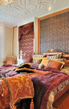Luxuriant Bedroom In Warm Color Royalty Free Stock Image