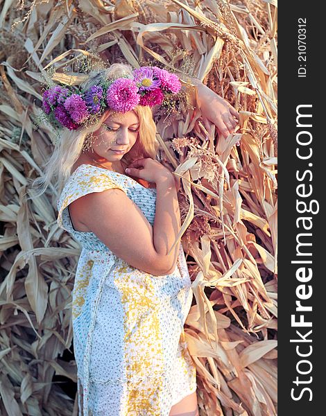 Young Woman In Corn Haystack