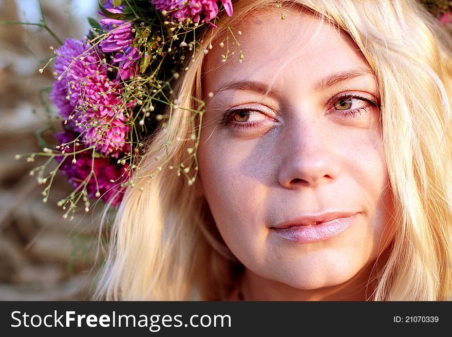 Young woman in corn haystack with wreath. Young woman in corn haystack with wreath