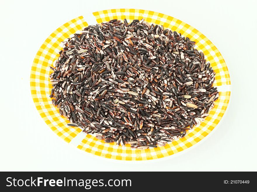 A dish of rice grain isolated on white background