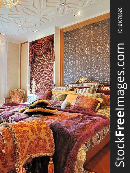 Bedroom in luxuriant and gorgeous decoration style, shown as classical, magnificent and comfortable living environment. Bedroom in luxuriant and gorgeous decoration style, shown as classical, magnificent and comfortable living environment.