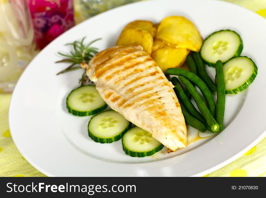 Stock Photo: grilled chicken breast with green bea