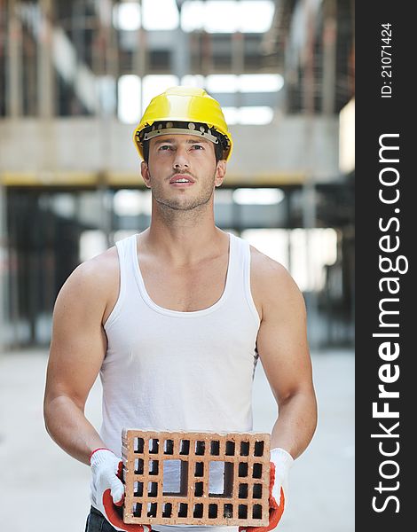 Handsome hard worker people portrait at concstruction site. Handsome hard worker people portrait at concstruction site