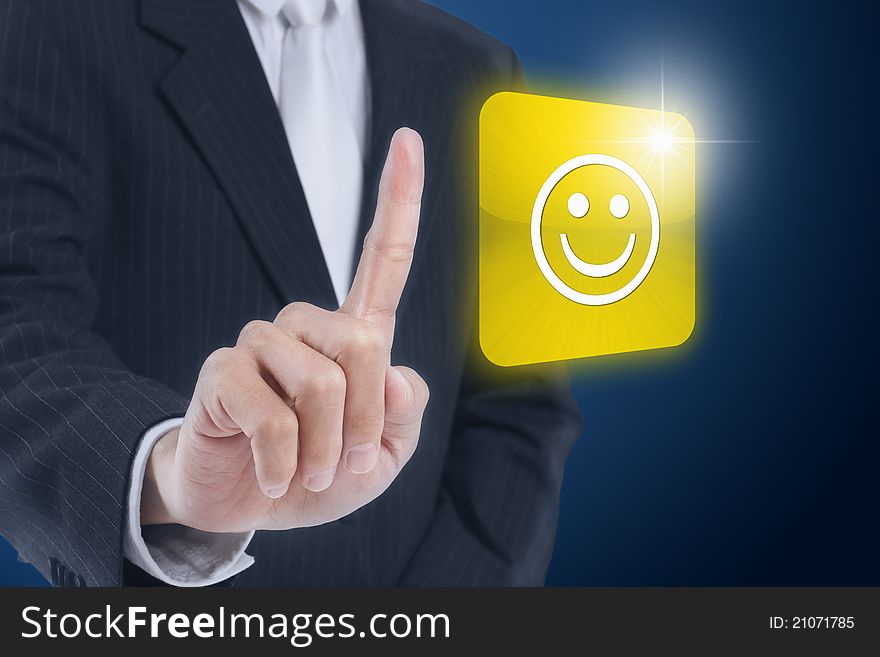 Businessman pressing smile icon touch screen button. Businessman pressing smile icon touch screen button