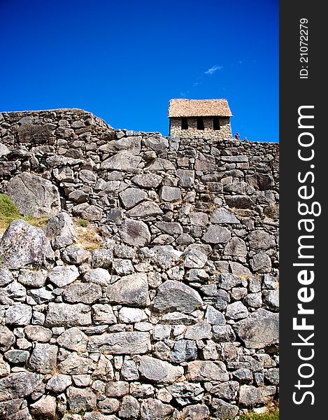 An Inca stone house in the ancient ruin Machu Picchu, Peru.