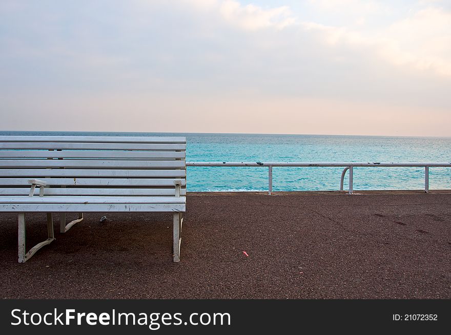 Bench in the promenade of coastal Nice, France.