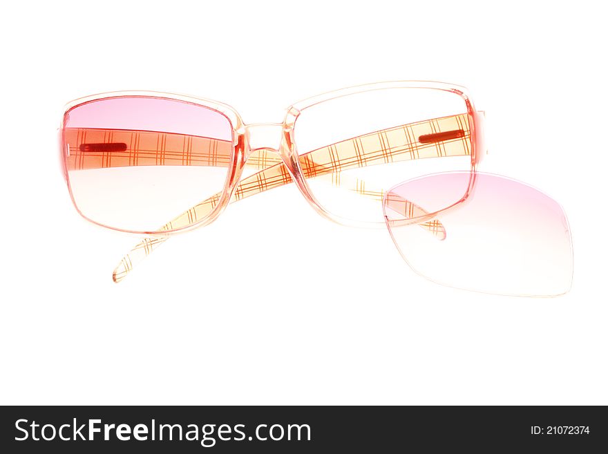 Red broken eyeglasses isolated on white background