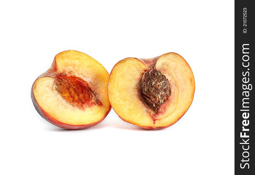 Sliced freshness peach fruit on white background. Sliced freshness peach fruit on white background