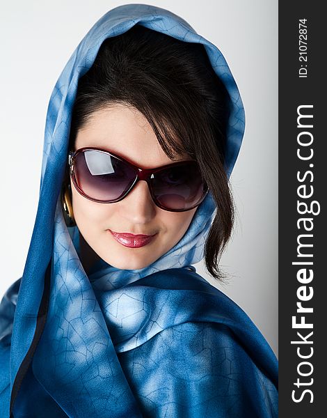 Portrait of young woman in big sunglasses. Portrait of young woman in big sunglasses.