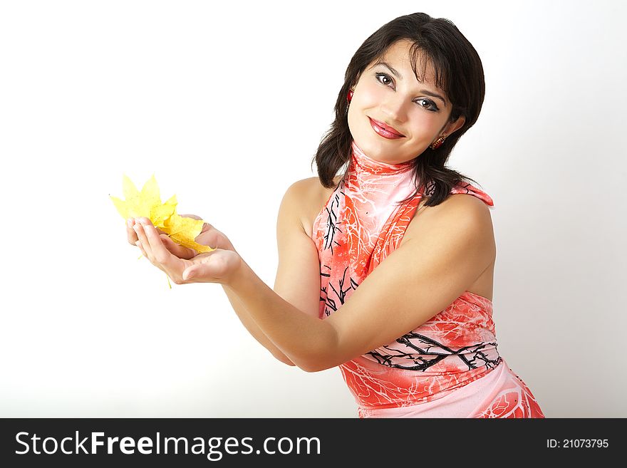 The young woman with autumn leaf. The young woman with autumn leaf.