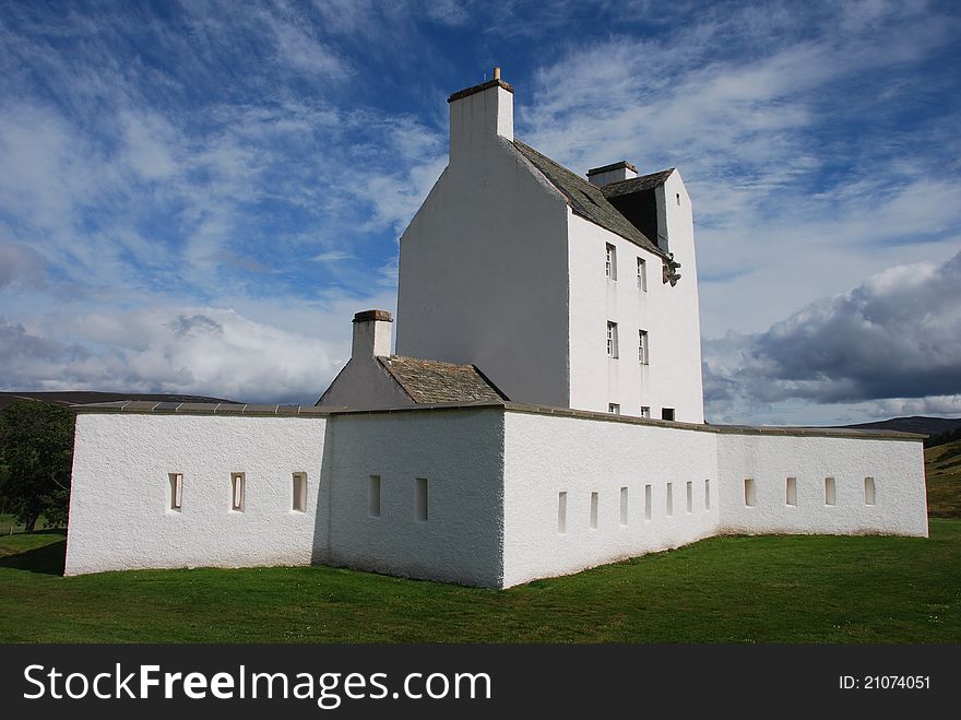 An exterior view of the six pointed star shaped defensive curtain wall at Corgaff Castle