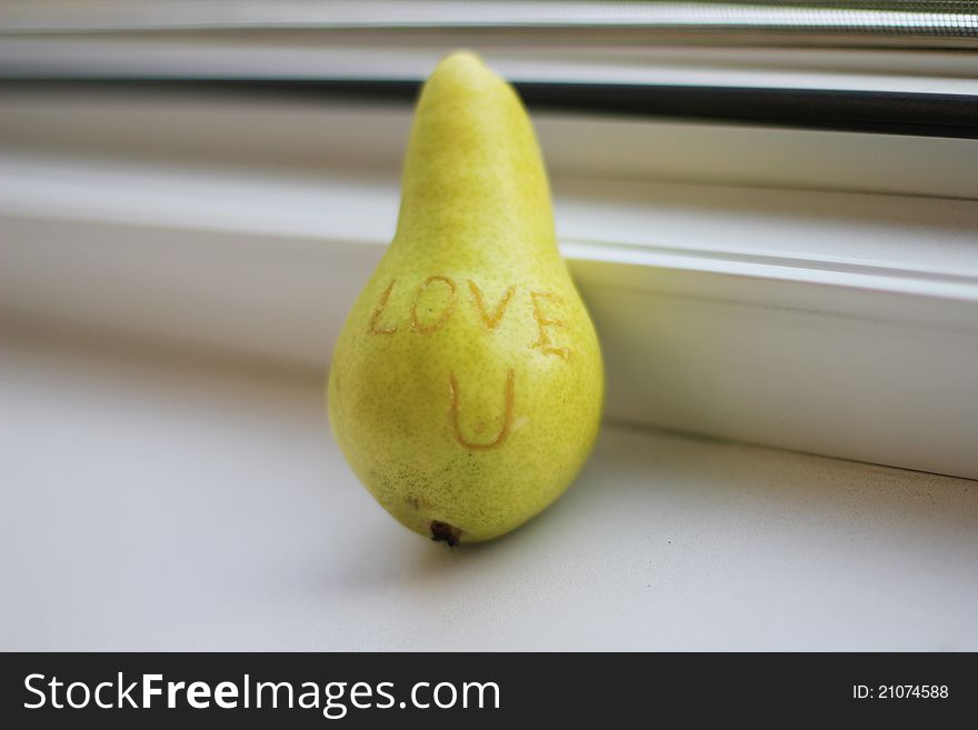 Pear with a declaration of love