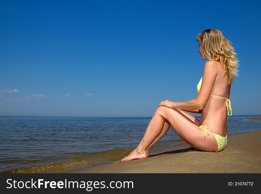 The beautiful woman on the beach