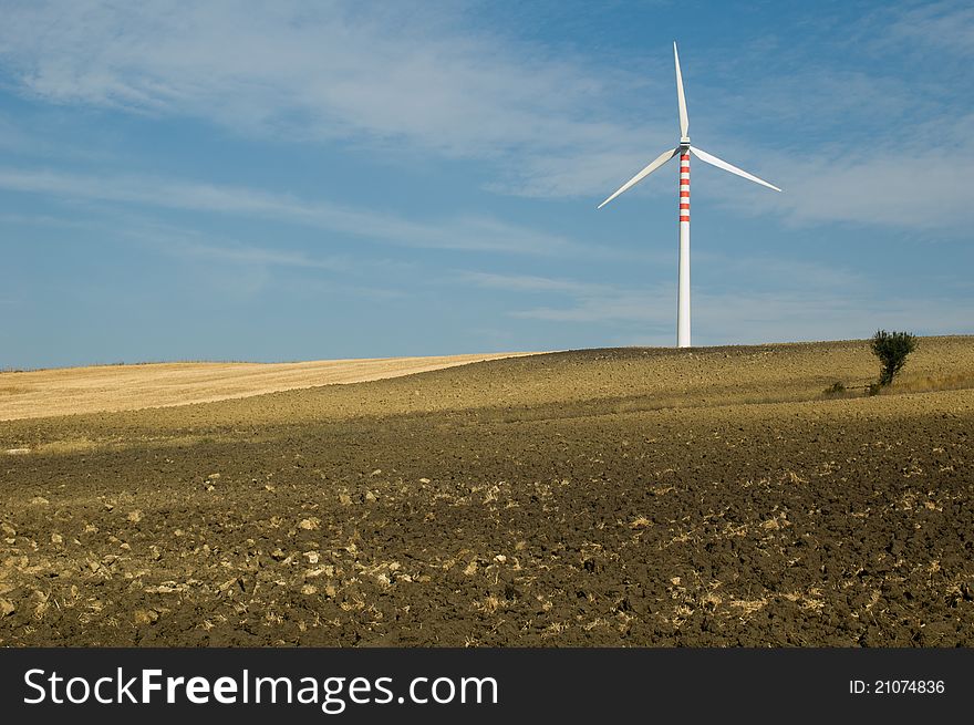 A wind generator in the Italian countryside
