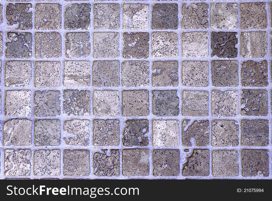 Closeup of a floor made with diferrent little square rocks. Closeup of a floor made with diferrent little square rocks