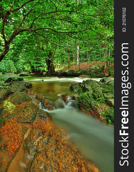 Image of peaceful waterfall in the rain fores. Image of peaceful waterfall in the rain fores
