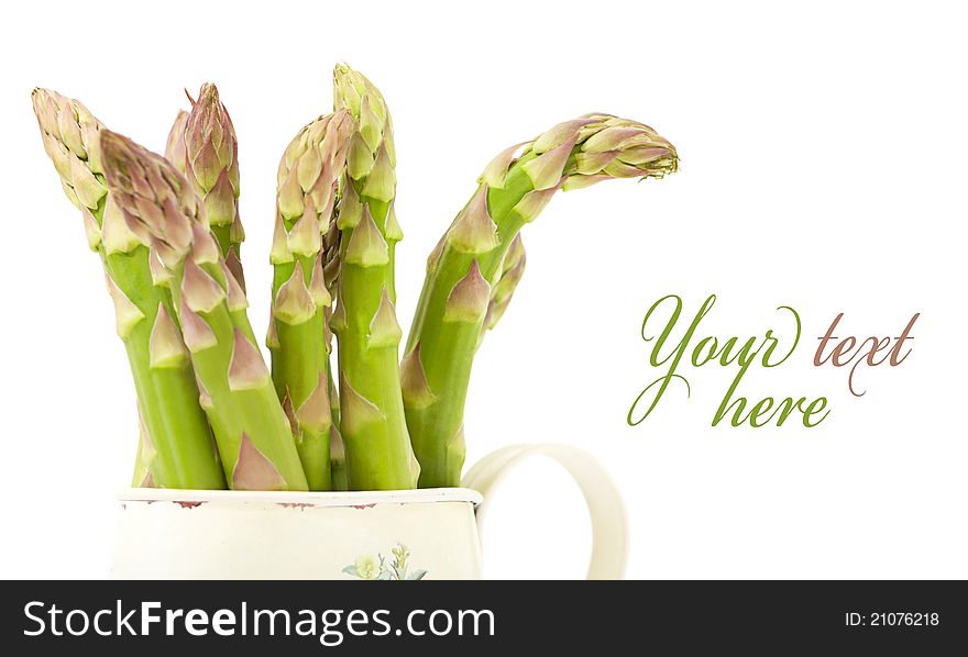 Bunch of fresh green asparagus isolated on white background